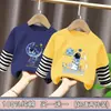 Camiseta de manga larga de algodón puro para niños, nuevo modelo primavera y otoño 2026, top de rayas de cuello redondo para otoño de niños, camiseta básica para niños mayores