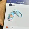Colgante de overol colorido y lindo, colgante de mochila de estudiante con dibujos animados lindos, pequeño regalo para mejores amigas