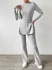 03 Explosões de Outono e Inverno Transfronteiriças Moda Elegante Versátil Casual Cor Sólida Slim Fit Emagrecedor Elegante Manga Longa Top Dividido