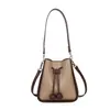Bolso bandolera tipo cubo de tela de lunares de moda estilo coreano para mujer, nuevo bolso de hombro para el verano 2026, nicho dulce y elegante, para el día a día