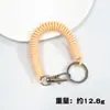 Juego de llaveros y tarjetas con cuerda de resorte de plástico, accesorios para bolsas, cordón elástico de color antipérdida, venta al por mayor