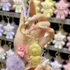 Nuevo Creativo Oso de Dibujos Animados Dorado en Forma de Estrella Llavero Dorado Lindo Colgante de Peluche de Dibujos Animados para Bolsa Venta al por Mayor