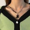 Collar con colgante de fantasma en blanco y negro con personalidad dulce y genial para hombre, estilo hip-hop, accesorios para parejas, cadena de suéter de alta gama para mujer.