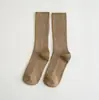 Calcetines de felpa para primavera y otoño color liso para niñas damas japoneses de doble aguja tubo de algodón calcetines de mujer fabricantes venta al por mayor