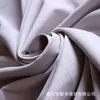 Tela pongee jacquard de rejilla de doble línea al por mayor, chaqueta ligera nueva con estándar europeo REACH, tejido softshell libre de flúor