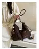 Bolsa feminina vintage 2025 novo modelo mochila, mochila para o dia a dia, bolsa versátil de ombro e transversal, bolsa tote de grande capacidade