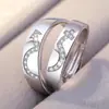Fornecimento transfronteiriço de joias europeias e americanas banhadas a prata anel de casal aberto feminino zircônia coreana anel de diamante de casamento anel de transmissão geração