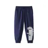 Ropa Infantil Transfronteriza 26 Años Pantalones Infantiles Otoño e Invierno Dibujos Animados Estampado Animal Abstracto Pantalones Largos Deportivos para Niños En Stock