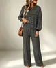 Moda europea y americana transfronteriza para mujer 2026 otoño nuevo Amazon conjunto casual de pantalones largos de punto a rayas y ropa deportiva para mujer