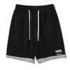Shorts versátil e moderno de corte solto estilo americano, secagem rápida, para homens, verão, calça de moletom falsa de duas peças, calça de cinco pontos de verão para homens