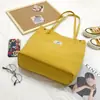 Bolsa Feminina 2026 Novo Estilo Fresca e Simples Bolsa de Lona de Grande Capacidade Bolsa de Ombro Feminina Bolsa de Mão para Estudante Bolsa de Lona Espessada