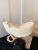 Bolso de mano tipo dumpling de diseño único, bolso cruzado para mujer estilo ins personalizado, nueva versión coreana primavera-verano 2026, bolso de hombro texturizado de moda