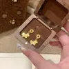 Pendientes de Moneda de Poni Dorado Brillante con Hielo Picado 2025 Nuevo Estilo Caliente Pendientes de Año Zodiacal Femeninos de Gama Alta Venta al por Mayor