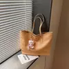 Bolsa Feminina Grande Capacidade Casual Transfronteiriça 2024 Nova Versátil Padrão Trançado Bolsa de Ombro para o Dia a Dia Bolsa Tote Simples