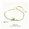 Collar Europeo y Americano Exquisito Cadena de Hueso de Serpiente Mariposa Verde Acero de Titanio Diseño Nicho para Mujer Sentido Avanzado Oro de 18k Cadena de Clavícula Moderna