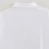 Ins atacado de roupas femininas estilo europeu e americano transfronteiriço outono novo camisa de cor sólida solta decorada com botões de fita trançada estilo Napoleão
