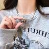Collar vintage de acero y titanio con borlas de cámara marrón para mujer, estilo Spice Girl, con diseño de cadena de sudadera con perlas y accesorios superpuestos.