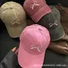 Gorra de béisbol con lazo para mujer, nueva moda primavera/verano, gorra de visera versátil bordada, sombrero de protección solar para hombre, casual y versátil