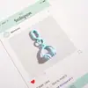 Novo Chaveiro Pingente de Fone de Ouvido de Liga Metálica Pintado com Desenho Animado Fofo Pingente de Bolsa Pequeno Presente Carro Pequeno Livro Vermelho