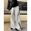 Pantalones de chándal de retazos a rayas estilo americano para hombre, diseño holgado de pierna recta y pierna ancha, colección primavera/otoño 2026, pantalones deportivos casuales de talla grande
