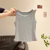 Conjunto de dos piezas para mujer: camiseta de manga larga con cuello redondo y estampado floral blanco y camisola, colección otoño 2026, corte ajustado, elegante y versátil