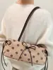 Bolso de axila de nicho estilo coreano Shuai Mi Jia para mujer, nuevo modelo de moda otoño 2026, bandolera baguette simple para el día a día