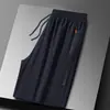 Pantalones Cortos Casuales de Seda de Hielo para Hombre Elásticos de Aire Acondicionado Pantalones Deportivos Juveniles de Secado Rápido Transfronterizos Delgados Pantalones de Playa