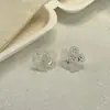 Pendientes únicos de flor hueca con incrustaciones de diamantes para mujer, modernos, versátiles, elegantes, personalizados, delicados y de lujo ligero