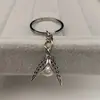 Colgante de Llave de Snitch Dorada Europea y Americana Llavero de Aleación Estilo Bohemio Harry Potter Venta al por Mayor Yiwu