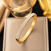 Explosiones transfronterizas Pulsera de acero de titanio de alta calidad Dorada Abierta Indeformable Celebridad Cibernética Simple Moda Pulsera Nicho Lujo Ligero