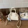 Bolsa de almohada de moda retro transfronteriza 2026, bolso versátil para ir al trabajo para mujer, bolso pequeño dulce de un solo hombro cruzado