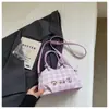 Bolso de mujer lindo de nicho súper popular 2026 nueva moda bolso cruzado versátil bolso de mano mini exquisito bolso tipo cubo