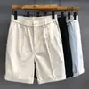 Pantalones cortos casuales de color liso de alta gama para hombre, marca de moda, pantalones elegantes y holgados de pierna recta de longitud media, pantalones cortos finos de verano para hombre