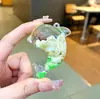Nuevo llavero de muñeca de delfín con arena movediza relleno de aceite, colgante para mochila, decoración para bolso de pareja, regalo pequeño para venta al por mayor