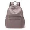 Mochila Feminina 2026 Novo Estilo Mochila de Ombro Duplo Moderna Bolsa Pequena de Viagem Moderna Leve Tecido Oxford Versátil Bolsa Feminina