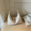Bolso liso de color para axila estilo perezoso 2026 verano nuevo bolso tipo empanada alta para el trabajo y el trayecto bandolera