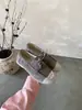Primavera 2026 Nuevo Estilo Mocasines de Piel Genuina con Cadena Metálica Punta Redonda con Cordones Piel de Vaca de Primera Capa Zapatos Casuales Mocasines de Suela Plana