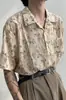 Camisa floral de manga curta vintage de nicho com gola cubana para homens e casais, camisa de praia solta retrô