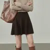 Saia de Tricô Cintura Alta para Mulheres 2025 Nova Outono Nicho Versátil Emagrecedor Elegante Saia Evasê