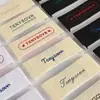 Etiqueta de cuello de ropa ropa personalizada etiqueta de tela etiqueta tejida personalizada etiqueta impresa personalizada etiqueta lavada personalizada diseño libre de marca registrada