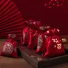 Bolsa de dulces para boda bolsa de dulces de satén impresa para boda bolsa de dulces de moda red bolsa de dulces de mano regalo de mano bolsa de dulces portátil de alta gama venta al por mayor