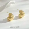 Lujo ligero textura de alta calidad metal cepillado bola cepillada nicho retro diseño simple europeo y americano sentido de diseño aretes de moda para mujer