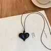 Collar de Cuerda de Cera con Lazo Retro Simple Otoño e Invierno para Mujer 2025 Nuevo Cadena Larga para Suéter de Cuello Halter de Alta Gama