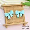 Dibujos animados lazo brillante accesorios de resina diy funda de teléfono móvil refrigerador soporte para teléfono móvil parche material para accesorios de cabello venta al por mayor