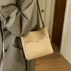Bolso Cubo Retro Esmerilado de Gran Capacidad para Mujer 2025 Invierno Nuevo Bolso de Hombro de Nicho para Viajes Diarios Bolso Cruzado de Gamuza