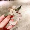 Anillo de pelo hueco con diamantes de imitación coreanos, cuerda para el pelo con perla para el intestino grueso, cuerda para la cabeza con cola de caballo de cristal con temperamento para mujer, cuerda de goma para tendón, accesorios para el cabello al por mayor