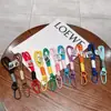 Estilo Minimalista Feito à Mão Corda Trançada Bloqueio de Cores Cordão Chaveiro Capa de Celular Alça de Pulso Portátil DIY Tendência Acessório de Nicho