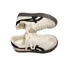 Zapatillas de entrenamiento retro alemanas en blanco y negro para mujer, zapatillas de suela plana con bloques de color, zapatos blancos casuales y versátiles, directo del fabricante