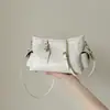 Bolsa feminina popular 2026 nova moda para o dia a dia tendência estilosa bolsa de ombro casual simples versátil bolsa transversal cor sólida