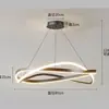 Lámpara de araña minimalista para restaurante y sala de estar en Guangdong Zhongshan, luz principal simple y elegante, lámpara de hierro de estilo minimalista circular de lujo ligero